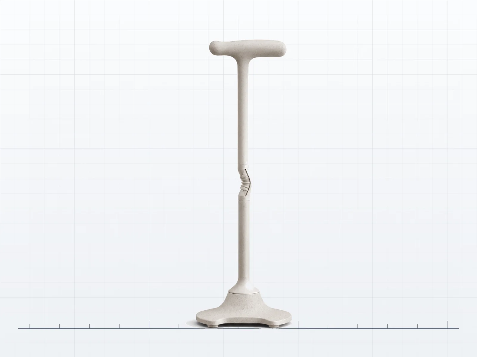 Prototype study of an adaptive walking support standing on a measured plate: horizontal grip, straight shaft, flex element, and a wide ground base.
